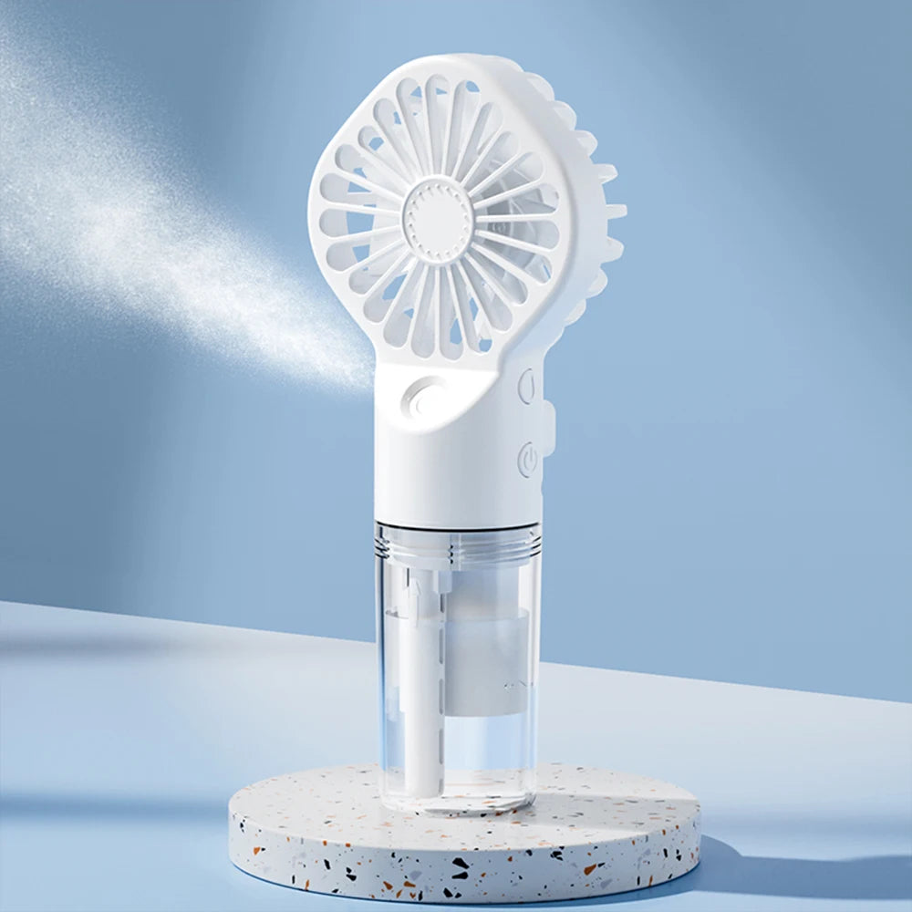 Ventilador portátil con pulverizador de agua 2 en 1 Mini ventilador de mano recargable por USB con función humidificadora y spray refrescante.